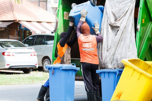 Professional team handling muck away services